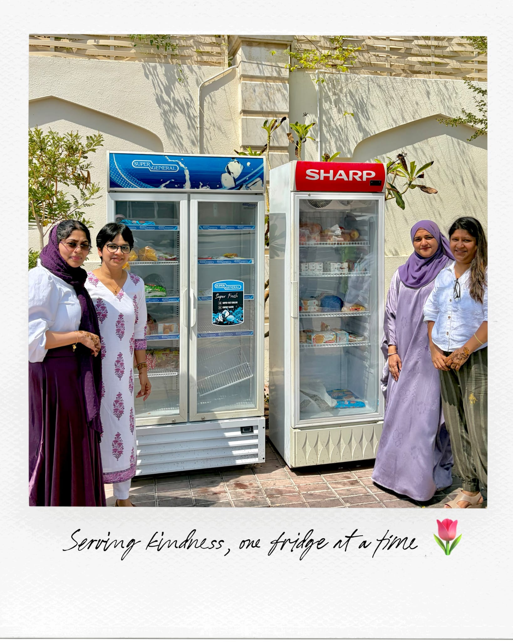 Ignite The Soul community members restocking a shared community fridge